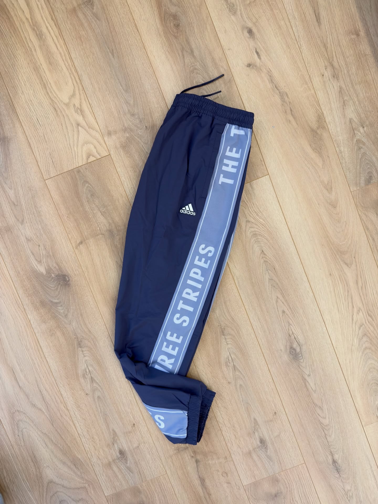 adidas Essentials 3-Stripes Woven Track Pants – Navy